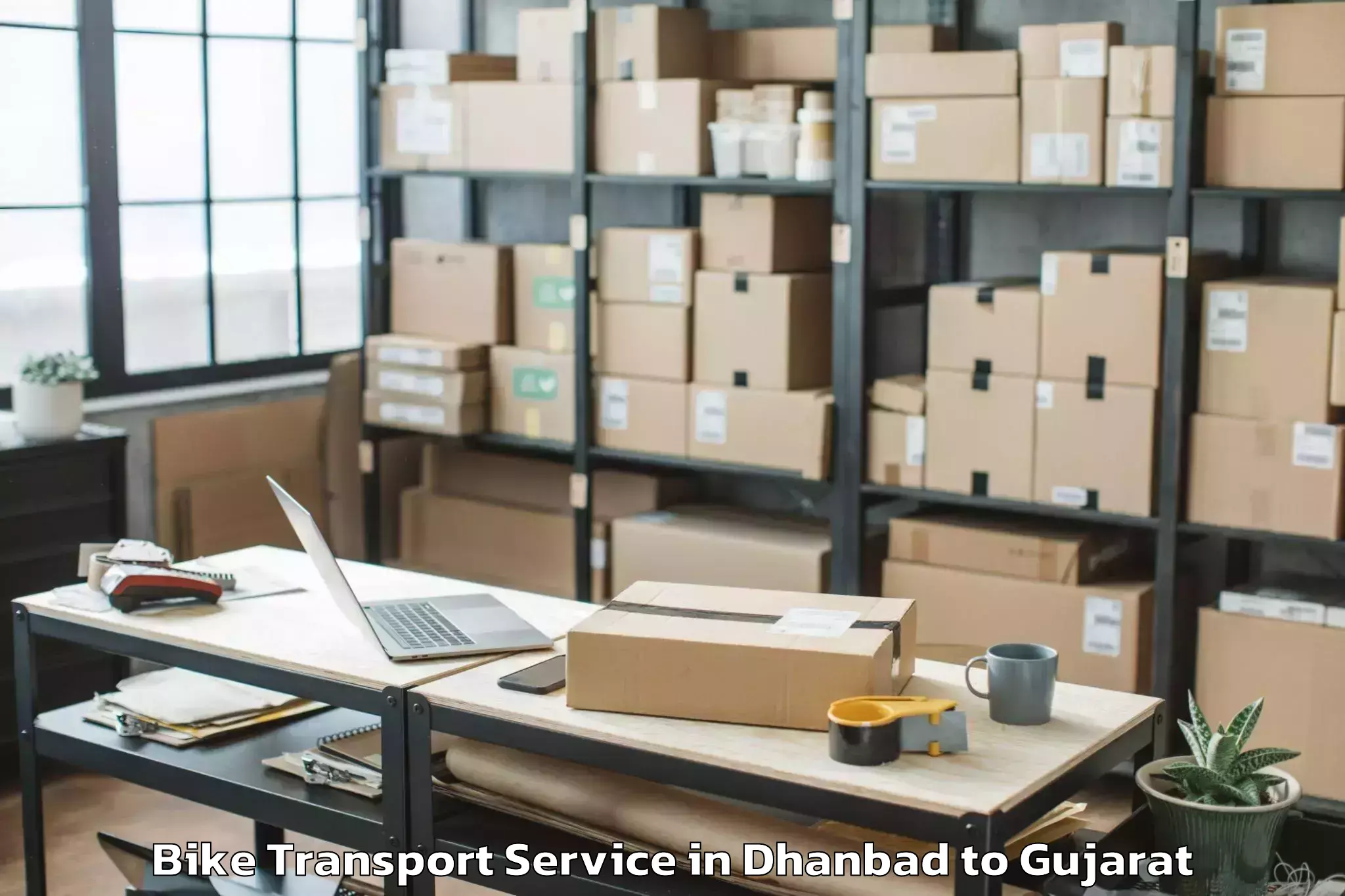 Hassle-Free Dhanbad to Adalaj Bike Transport